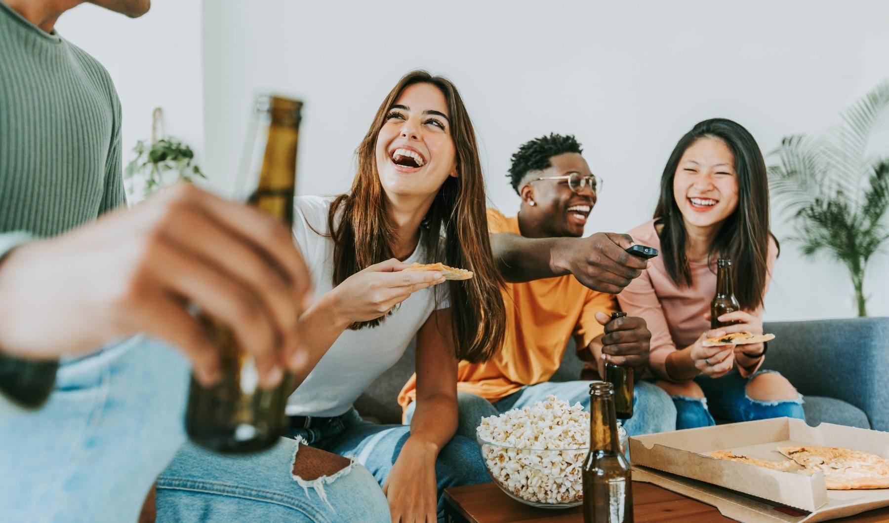 Vibrant community life with a variety of dining options a group of people sitting around a table with food and drinks